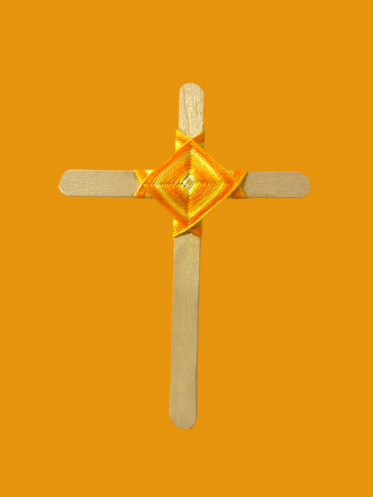 Cross popsicle sticks with God’s eye craft.