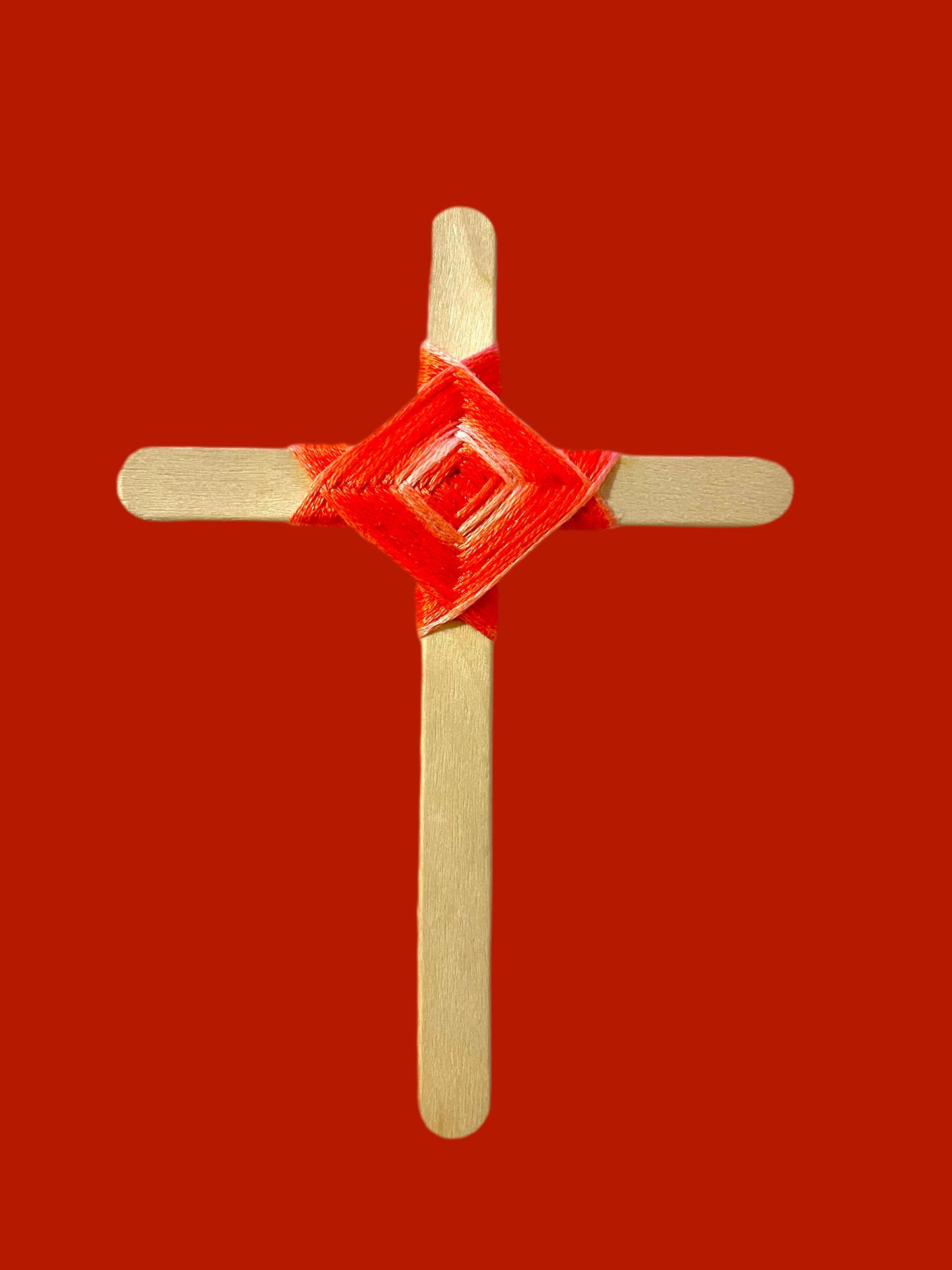 Cross popsicle sticks with God’s eye craft.