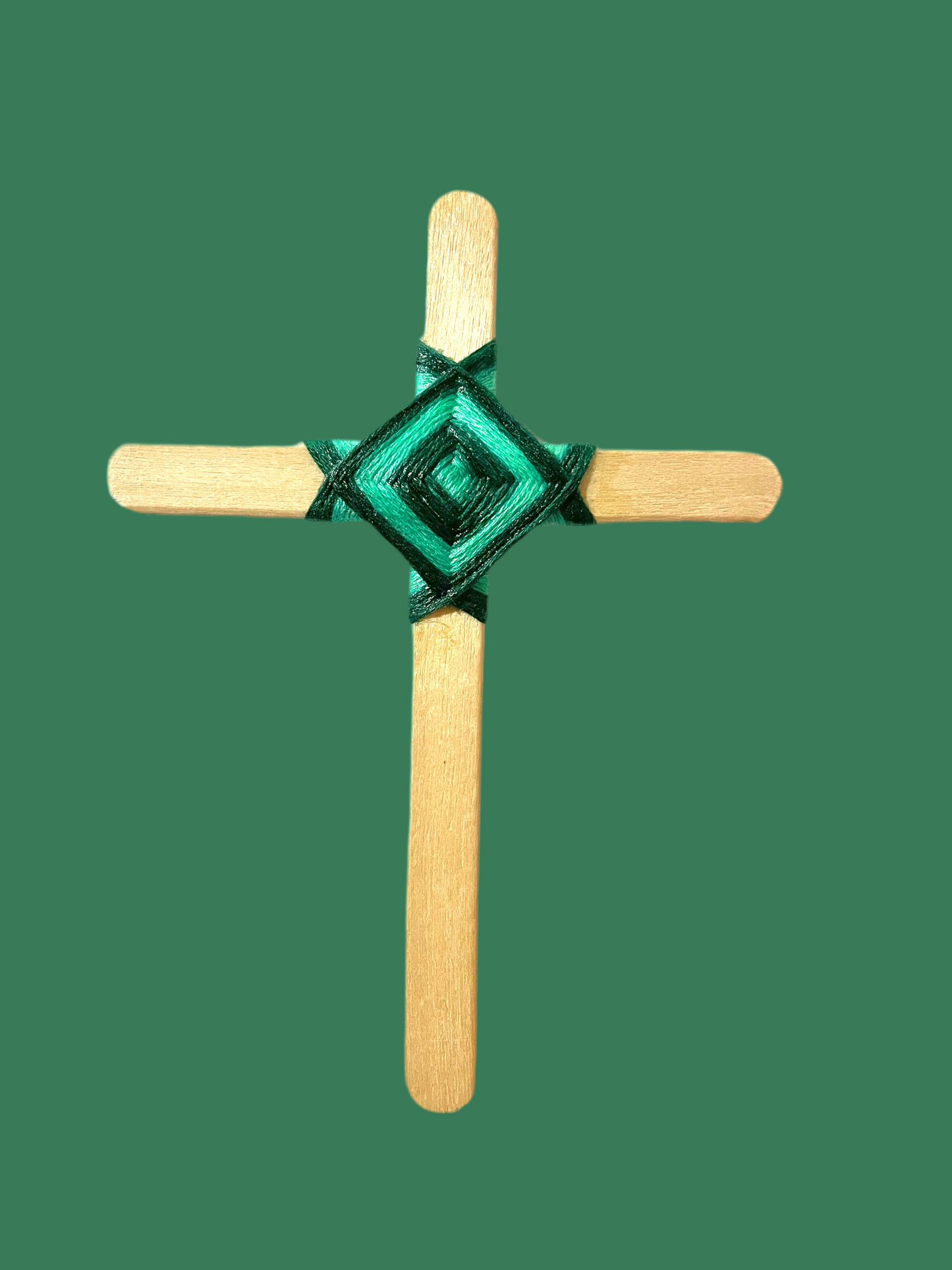 Cross popsicle sticks with God’s eye craft.